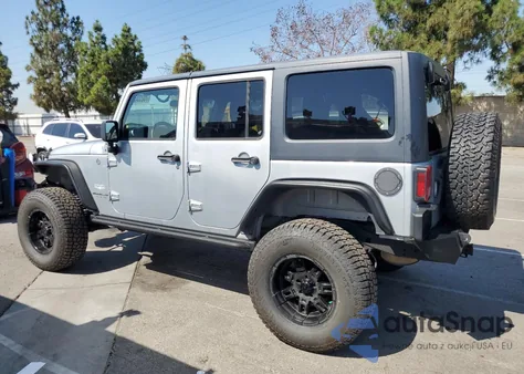 2011 Jeep Wrangler Unlimited Sahara из США, поврежденный, VIN 1J4BA5H16BL521963